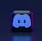 A 3D-style block with a blue logo in the center, set against a dark background. The logo resembles a game controller with two rounded edges and two circles on the front. The block has a subtle gradient, transitioning from dark to purple on its sides.